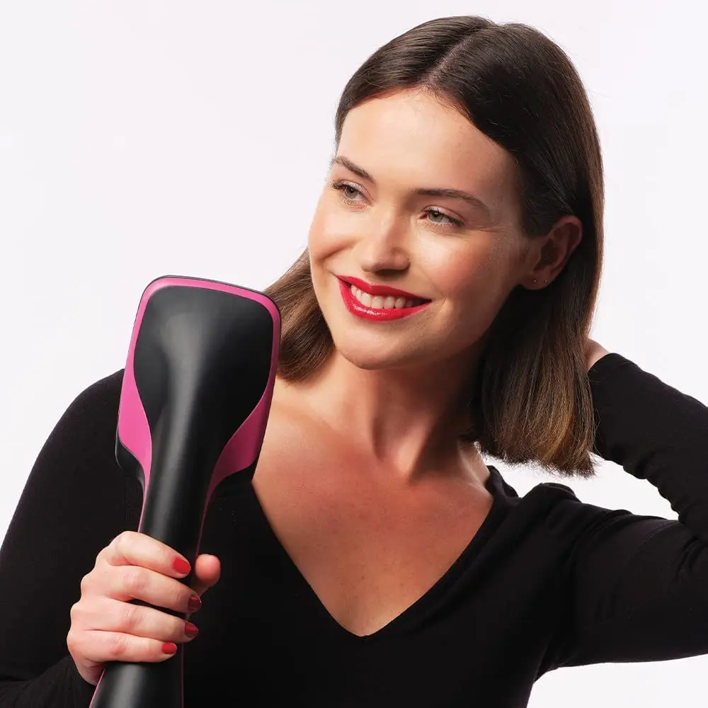 The Revlon One-Step hair dryer and styler features a large paddle design with flexible, tangle-free bristles for smooth, frizz-free results.