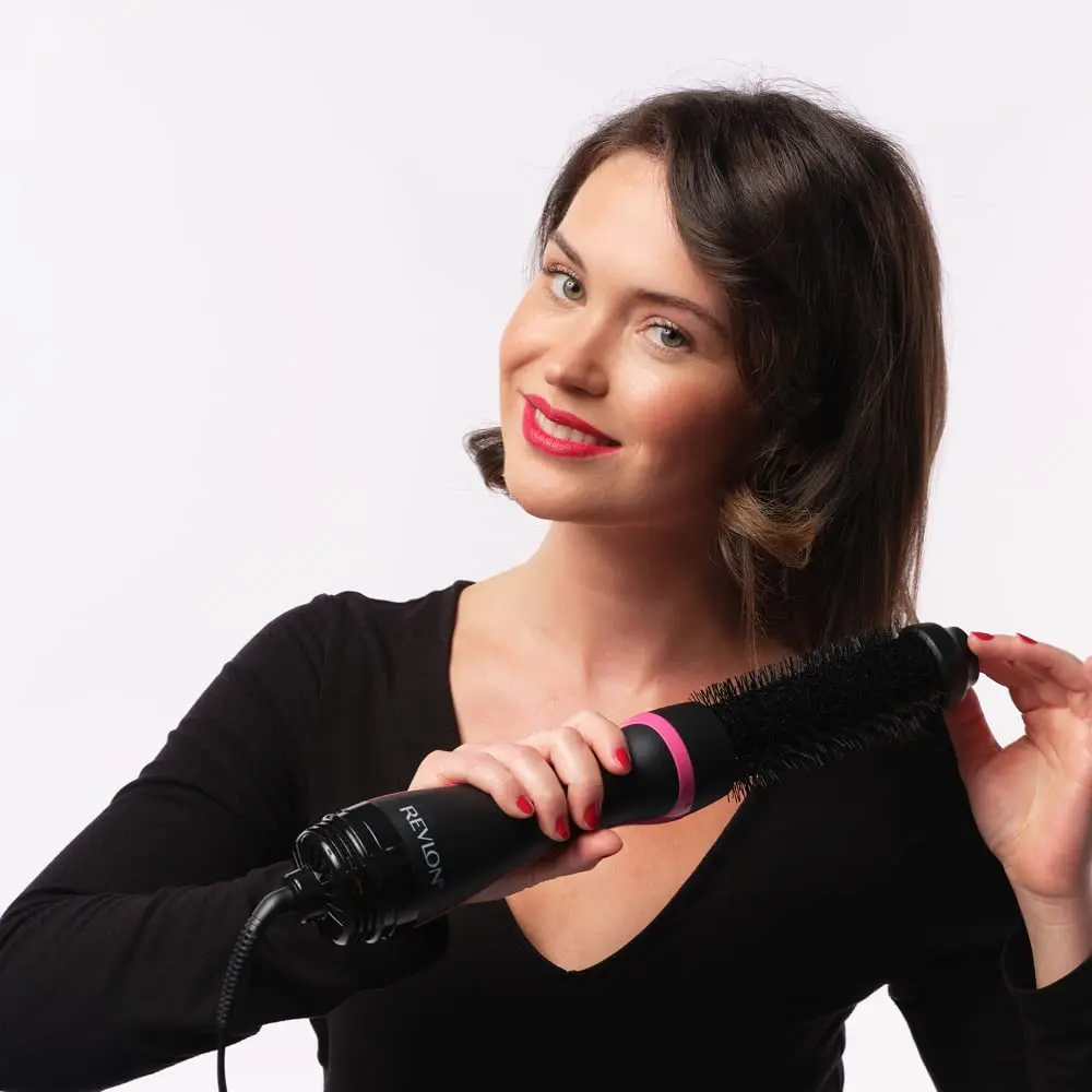 The Revlon One Step Root Booster Dryer and Styler dries, styles, and boosts roots while reducing frizz and adding shine for healthy-looking hair.