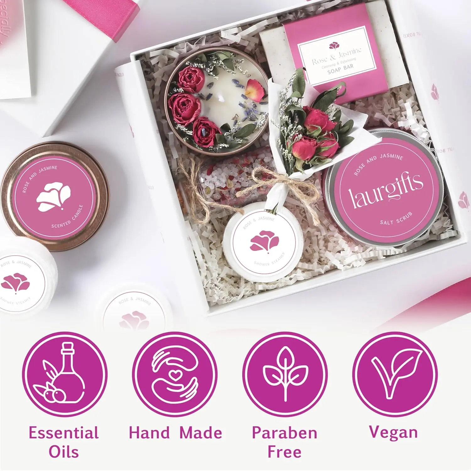 This small rose and jasmine spa gift box is perfect for birthdays, Mother's Day, or Teacher Appreciation, containing a candle, shower steamers, soap, bath salts, salt scrub, and dried flowers for a romantic and relaxing at-home spa experience.