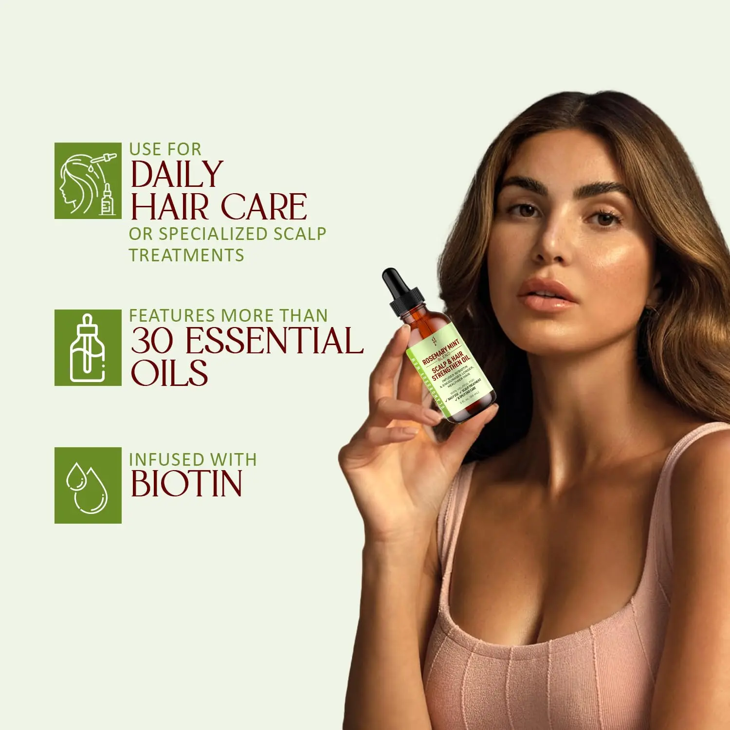 Nourishing rosemary mint hair oil infused with biotin to strengthen hair, soothe dry scalp, and smooth split ends for healthy, radiant hair.