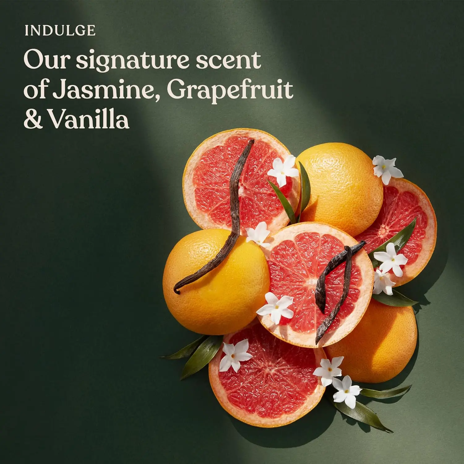 Sanctuary Spa Signature Collection gift set with body wash, scrub, lotion, butter, and puff, a vegan self-care treat in a travel-friendly bag.