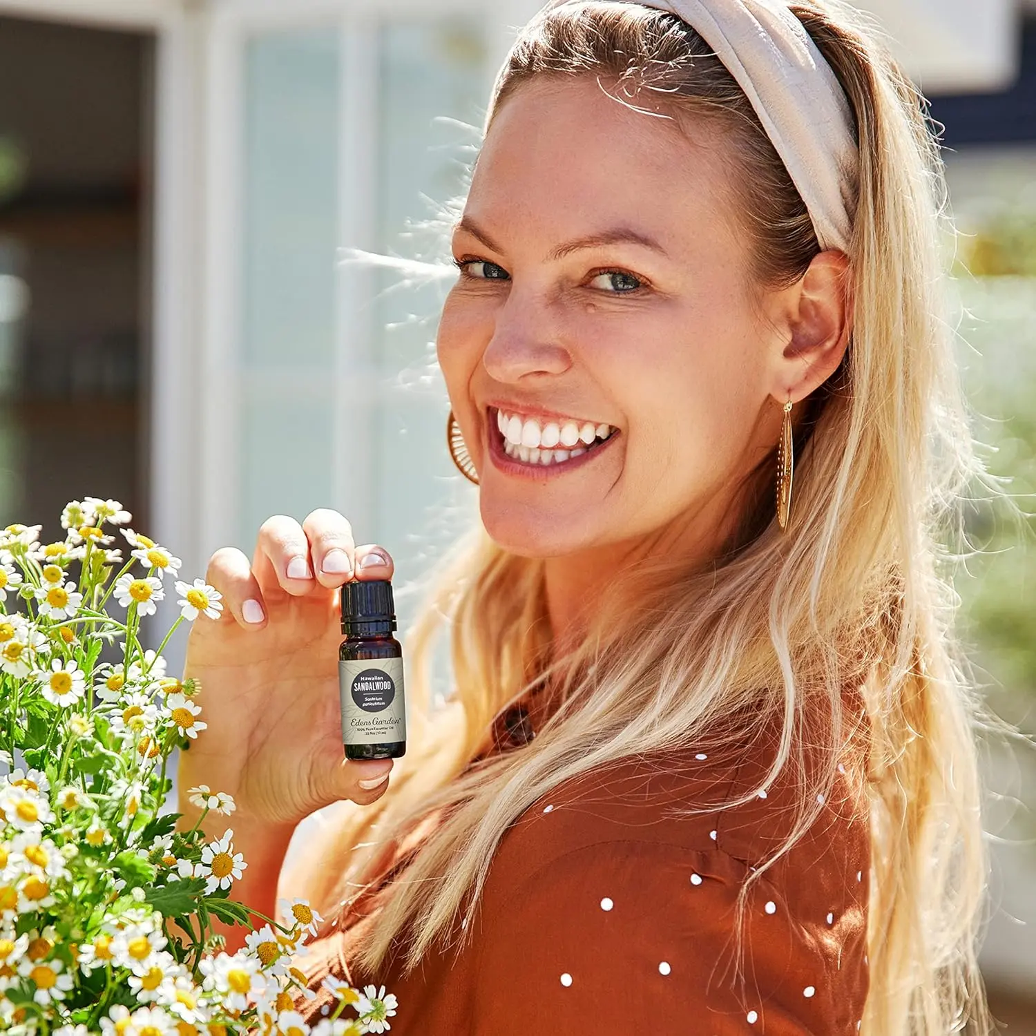 Bottle of Edens Garden Hawaiian Sandalwood essential oil, steam-distilled for a rich, sweet, and tranquil aroma perfect for relaxation and aromatherapy.