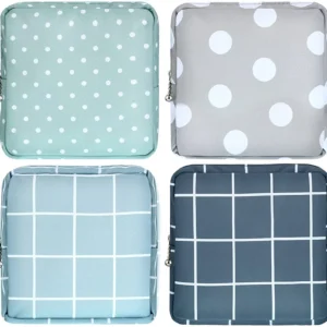 This image shows four portable sanitary napkin storage bags with zipper closures in different colors and patterns, perfect for organizing menstrual pads and other small items for women and teen girls.