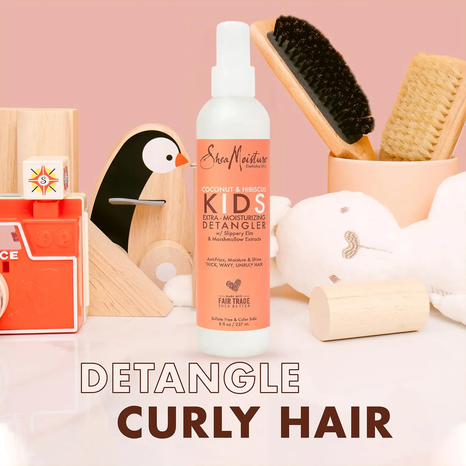Shea Moisture kids hair care combination pack includes extra-nourishing mango and carrot shampoo, extra-nourishing mango and carrot conditioner, and coconut and hibiscus detangler for soft, smooth, healthy hair.