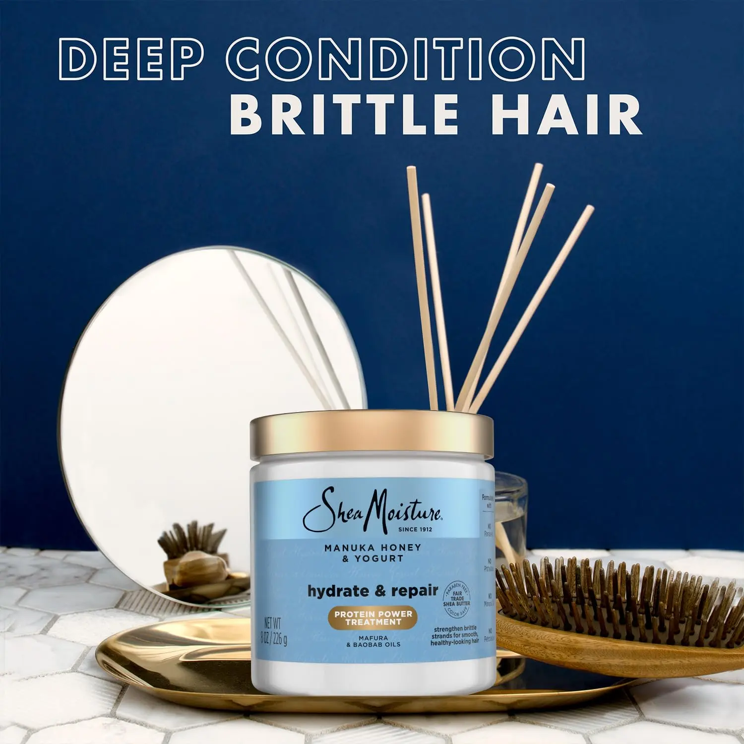 Shea Moisture Manuka Honey and Yogurt hair mask deeply conditions, repairs, and hydrates dry, damaged hair while reducing breakage and frizz.