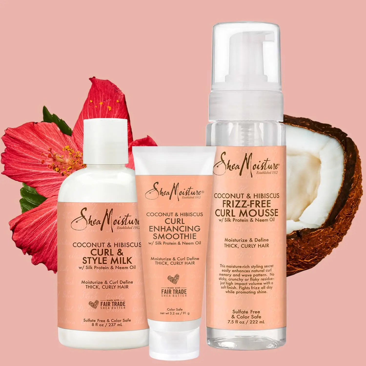 SheaMoisture Coconut & Hibiscus hair product bundle featuring Curl Enhancing Smoothie, Curl & Style Milk, and Frizz Free Curl Mousse for moisturizing, defining, and controlling frizz in curly hair.