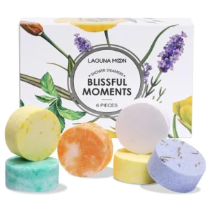 Six aromatherapy shower steamers made with pure essential oils in an elegant gift box, perfect for creating a relaxing spa experience at home.