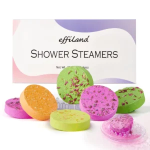 This aromatherapy shower steamer gift set includes six shower bombs with lavender, eucalyptus, mint, and orange scents, along with a soap saver for a relaxing self-care experience.