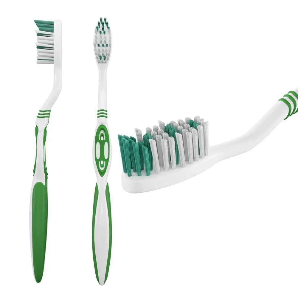 A medium bristle SIGNAL Triple Protection toothbrush, designed for gentle plaque removal and gum massage.