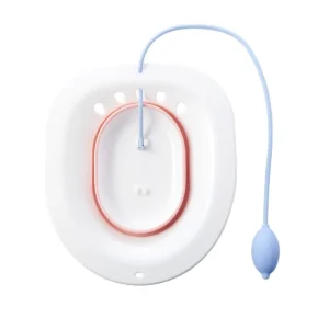 This pink foldable sitz bath is designed to fit over most toilets, providing comfortable relief and simulating human buttocks, ideal for hemorrhoid treatment, postpartum care, pregnant women, and the elderly.