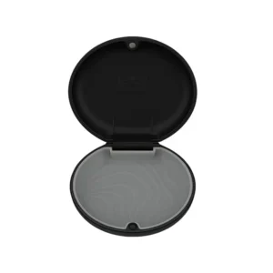 This slim, black Dentosmile retainer case securely holds aligners and retainers, offering convenient and sanitary storage while traveling.