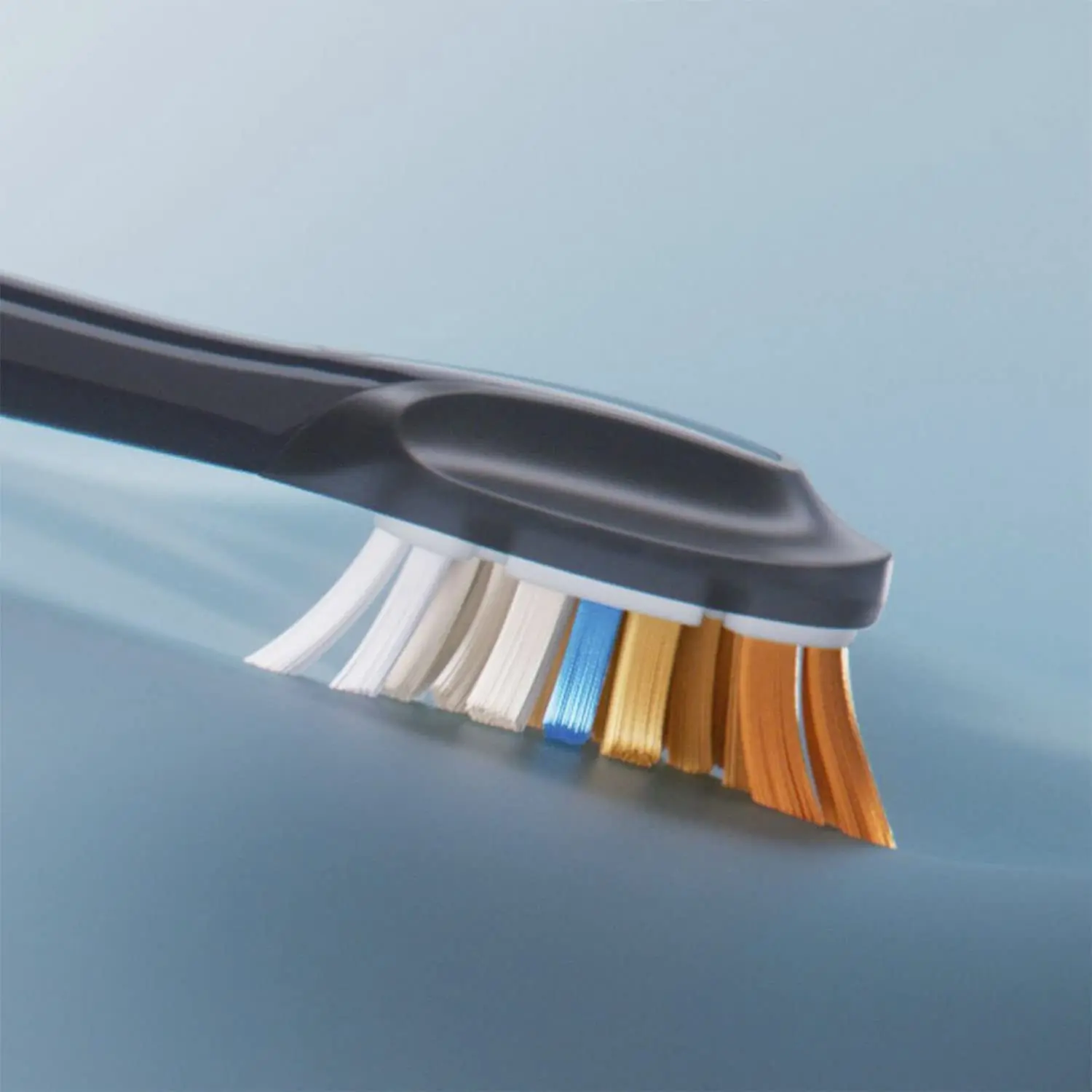 Two black Philips Sonicare HX9092/96 All-In-One brush heads designed for superior plaque removal, stain removal, and gum health, featuring angled bristles, triangular tips and extra-reach side bristles.