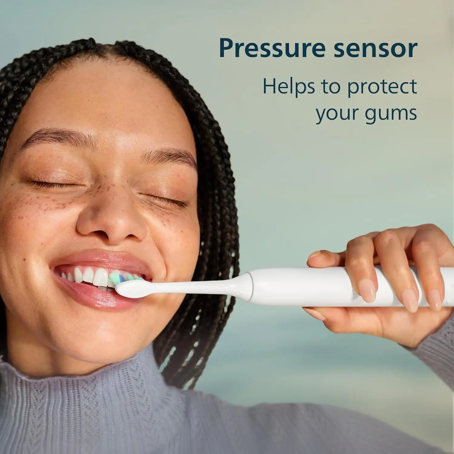 The Philips Sonicare 4100 electric toothbrush in white provides advanced plaque removal and gentle gum care with its pressure sensor and rechargeable handle.