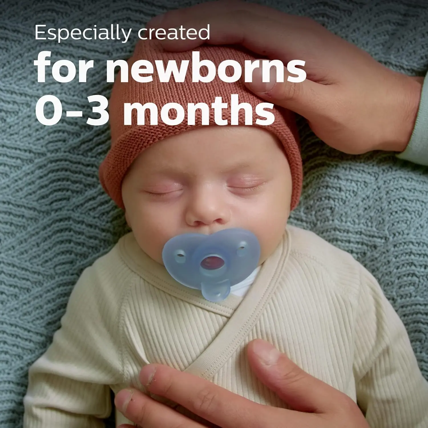 The Philips AVENT Soothie heart-shaped pacifier, in blue and light blue, is a safe and comfortable choice for newborns aged 0-3 months, trusted by hospitals and made from BPA-free silicone.