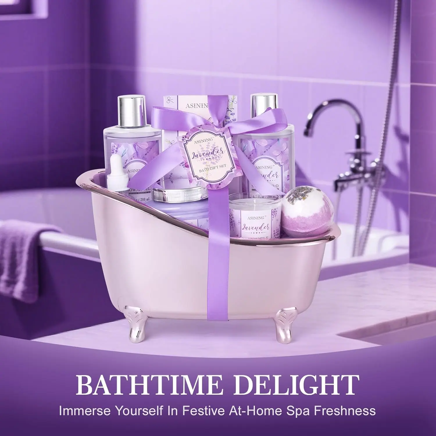This spa gift basket for women includes lavender-scented bath and beauty essentials like shampoo, bath salts, a soy candle, and a decorative bathtub holder for a luxurious at-home spa experience.