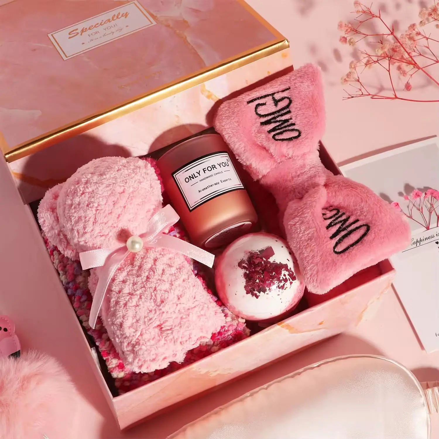 Luxurious spa gift box for women featuring bath bombs, diamond soap, a candle, and other self-care accessories, beautifully packaged with dried flowers for a perfect relaxation gift.