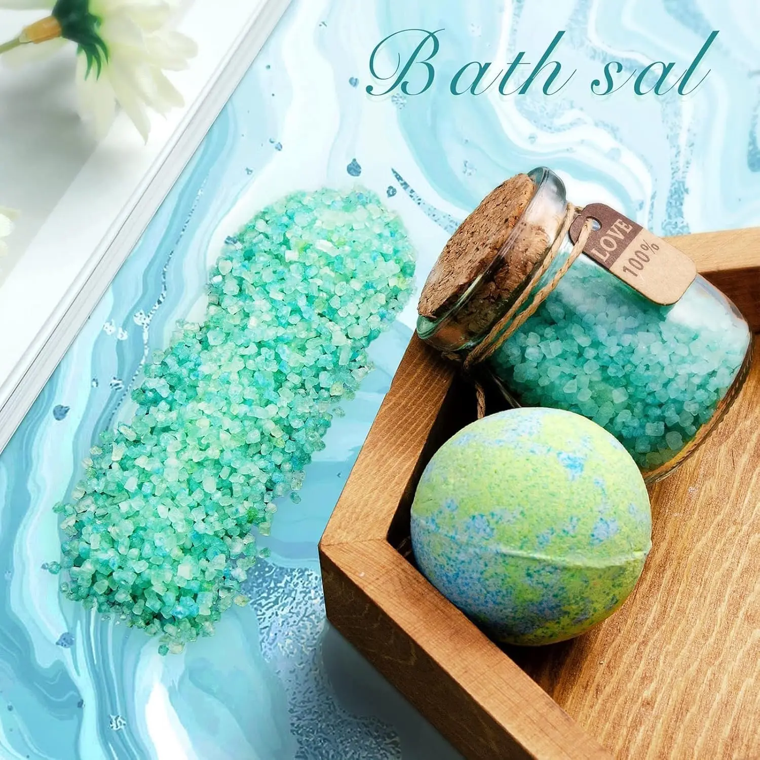 This luxury spa gift set for women includes a lavender bath bomb, handmade soap, bath salts, scented candle, eye mask, headband and greeting card, all arranged in a beautiful gift box.