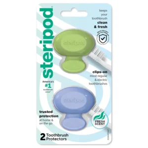 Two Steripod clip-on toothbrush protectors, one green and one blue, offering bristle protection with fresh-scented thymol vapors.