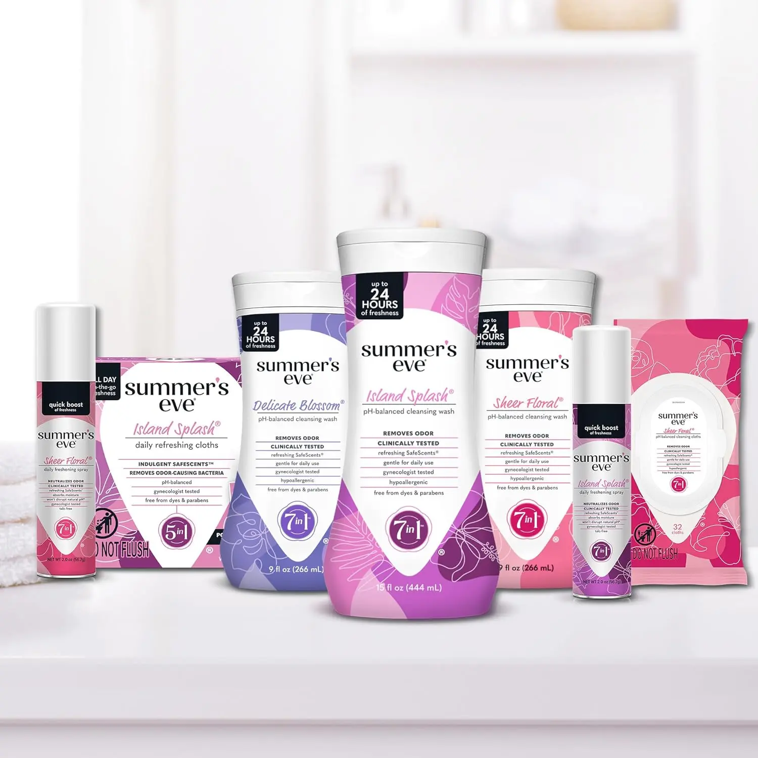 Four packs of Summer's Eve Sheer Floral feminine cleansing wipes, individually wrapped and pH-balanced for gentle, on-the-go freshness.