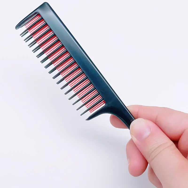 This triple teasing comb with a tail is perfect for women with fine hair, adding volume, sectioning, and styling with its three rows of teeth.