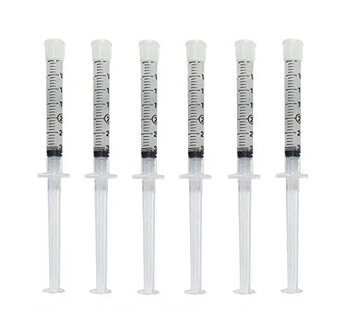 Six 44% carbamide peroxide teeth whitening gel syringes for effective stain removal from coffee, tea, wine, and aging, providing a fast, safe, and convenient at-home teeth whitening solution.