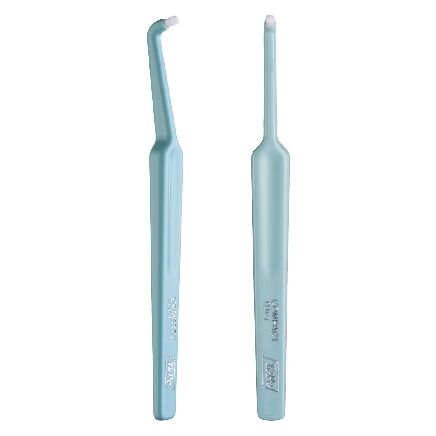 A close-up of the TePe Compact Tuft Brush, a small, angled toothbrush with soft, round bristles, designed for cleaning around implants, bridges, and braces.