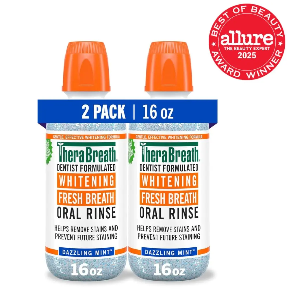 Two bottles of TheraBreath Dazzling Mint Whitening Mouthwash, a dentist-formulated, alcohol-free oral rinse designed to remove stains, prevent future staining, and freshen breath without peroxide.