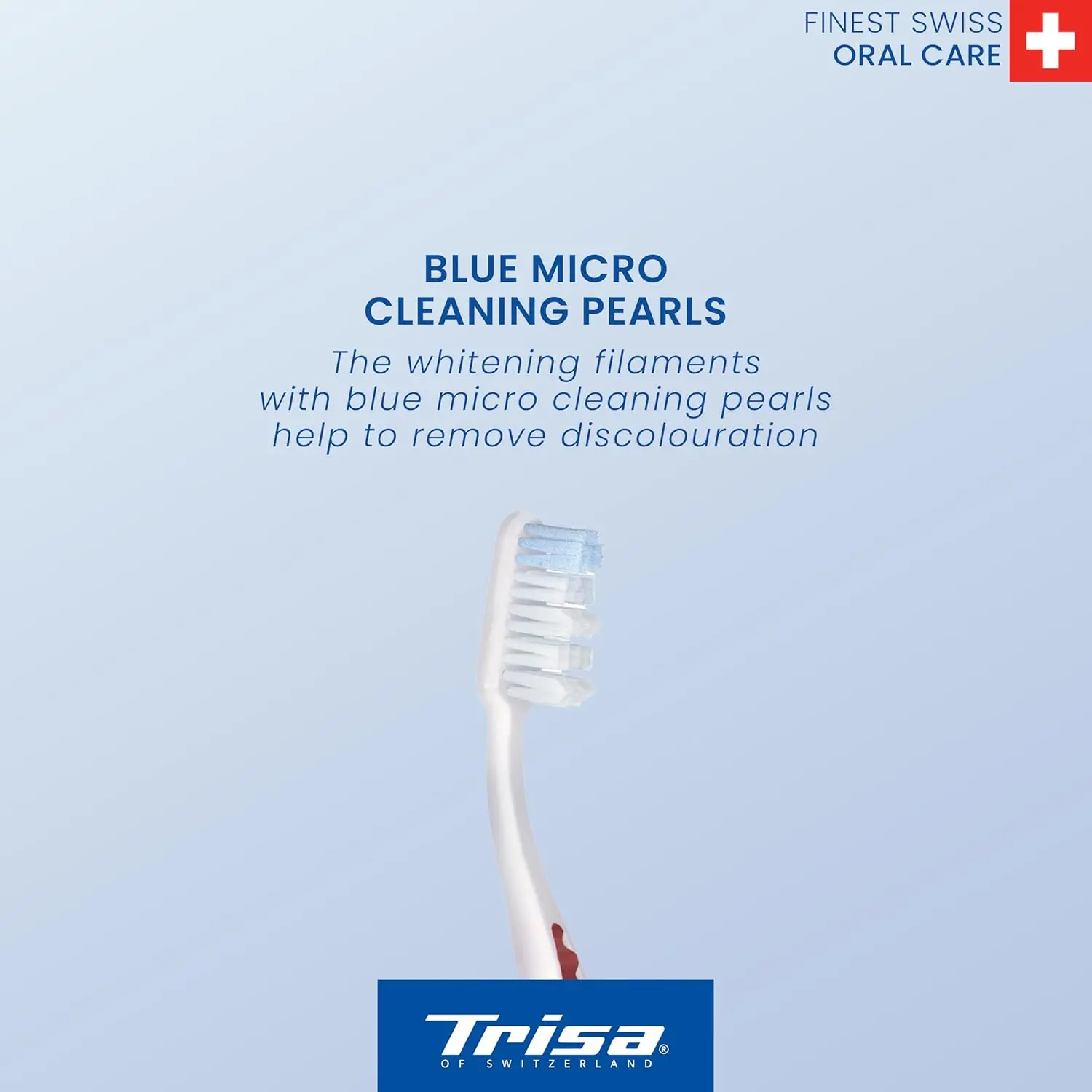 This image shows a Trisa Pearl White soft toothbrush, designed with whitening filaments and blue micro cleaning pearls to help remove discoloration for a whiter, brighter smile.