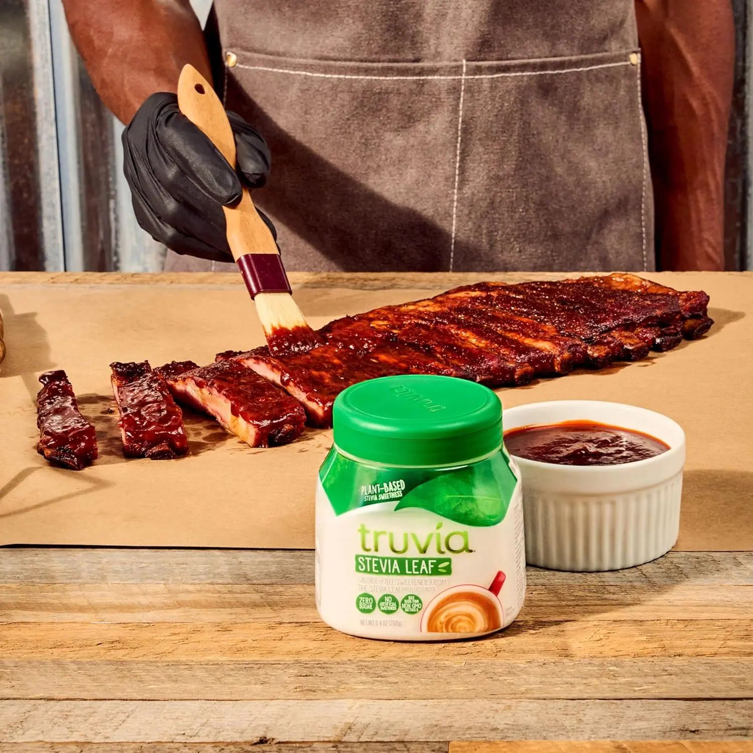 A 9.8 ounce container of Truvia natural sweetener, made from the stevia leaf, offering a zero-calorie alternative to sugar for sweetening food and drinks.