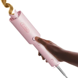The TYMO CURLPRO automatic rotating curling iron in pink effortlessly creates beautiful beach waves with its tourmaline ceramic coating and ionic technology, ensuring shiny, long-lasting curls.