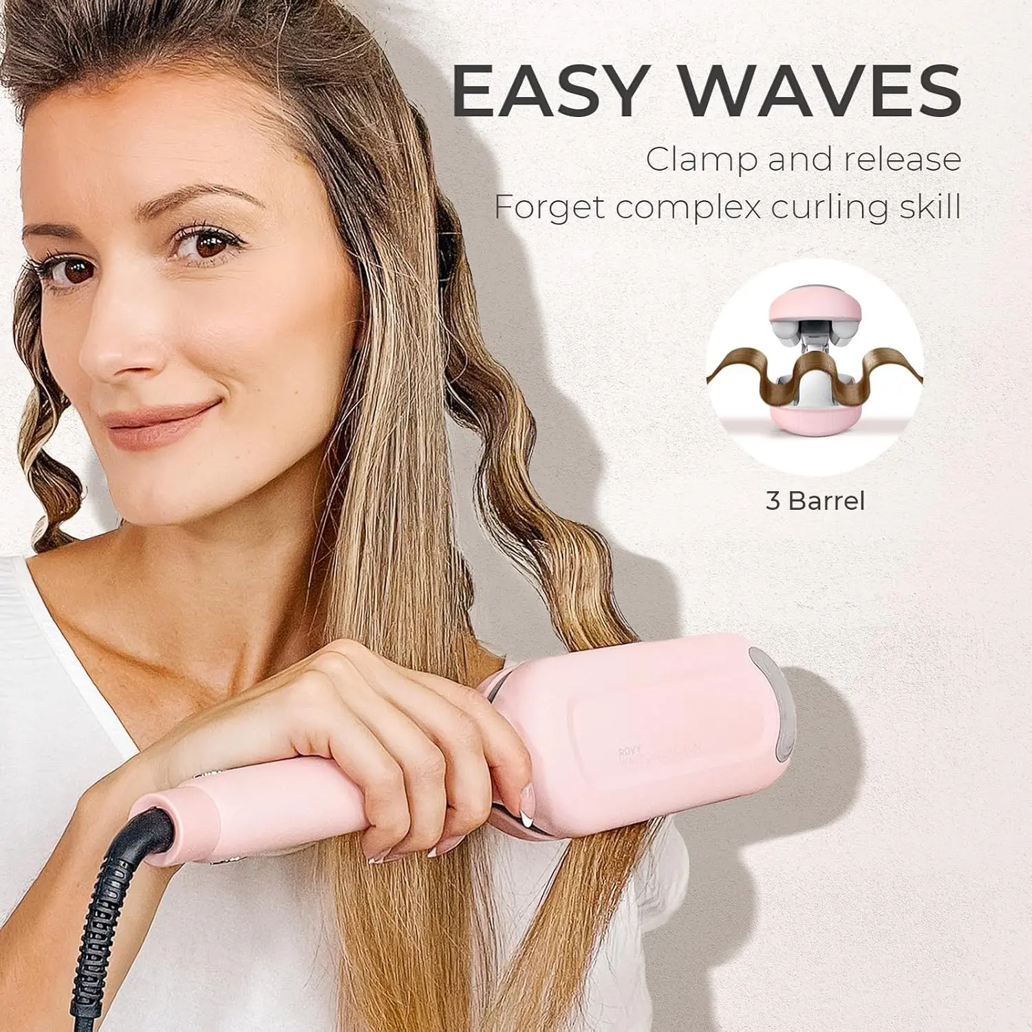The TYMO ROVY pink hair waver creates beautiful, long-lasting beach waves quickly and easily with its tourmaline ceramic barrel and anti-scald design.