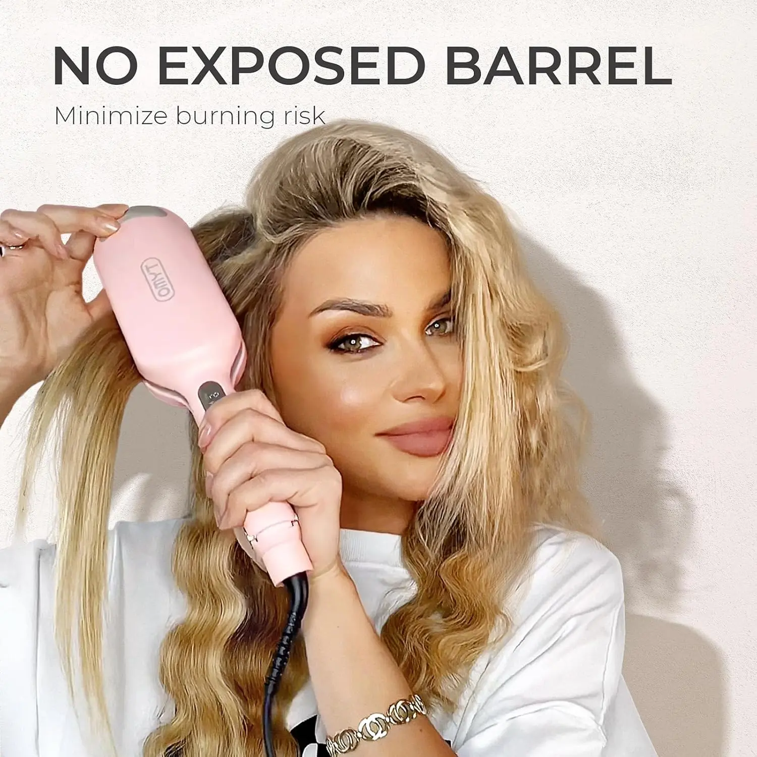 The TYMO ROVY pink hair waver creates beautiful, long-lasting beach waves quickly and easily with its tourmaline ceramic barrel and anti-scald design.