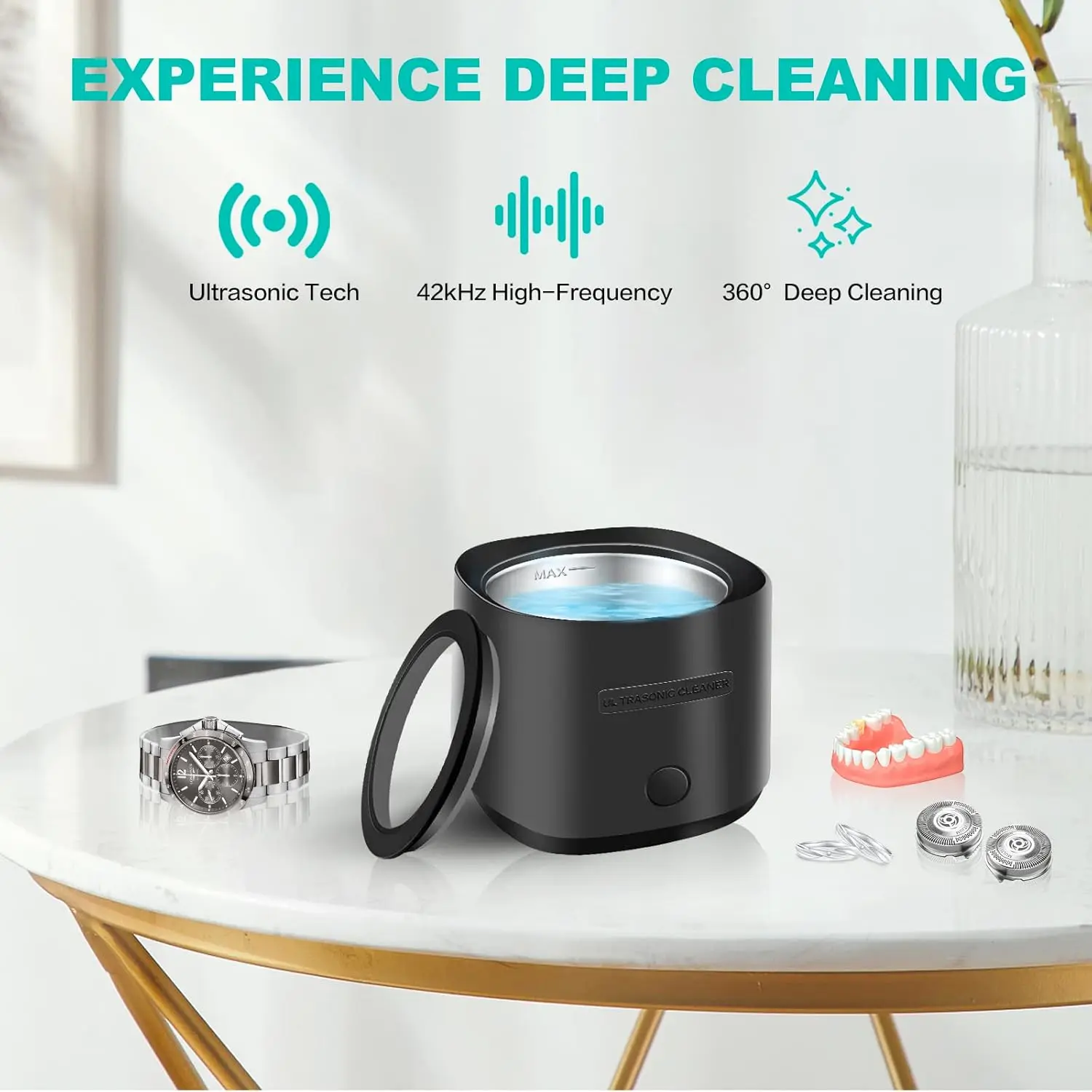 Black portable ultrasonic cleaner effectively removes particulates from dentures, retainers, aligners and mouthguards with 42kHz sound waves.