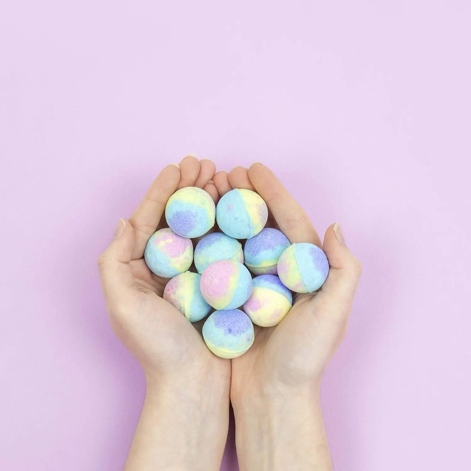 Ten raspberry-scented bath bombs create a magical unicorn-colored fizz in your bath.