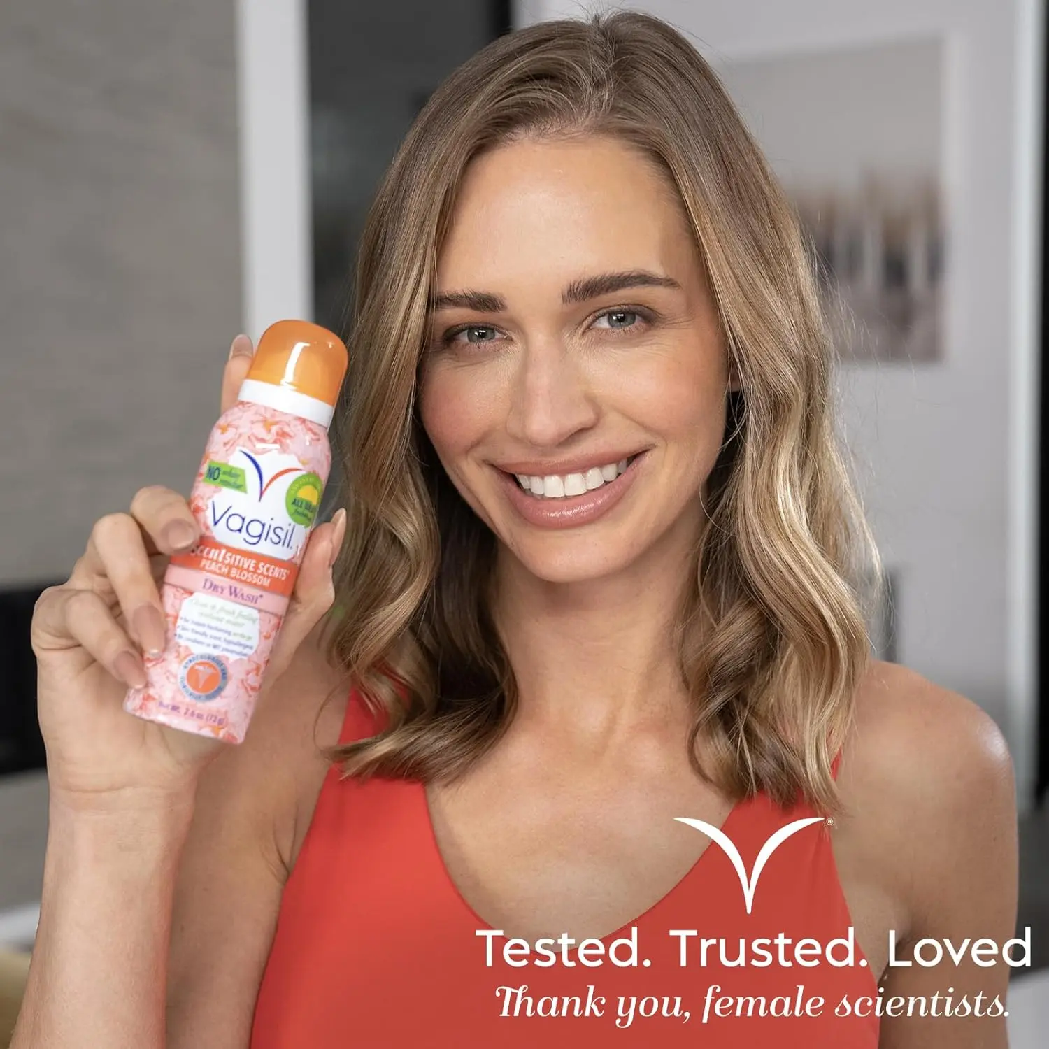 Four cans of Vagisil Peach Blossom Scentsitive Scents feminine dry wash spray provide a light, fruity, and convenient way to cleanse intimate skin without water, perfect for on-the-go freshness.