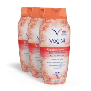 Three bottles of Vagisil Peach Blossom Scentsitive Scents feminine wash provide gentle and hypoallergenic cleansing for intimate area hygiene, formulated with Vitamin E for soothing freshness and a light, fruity fragrance.