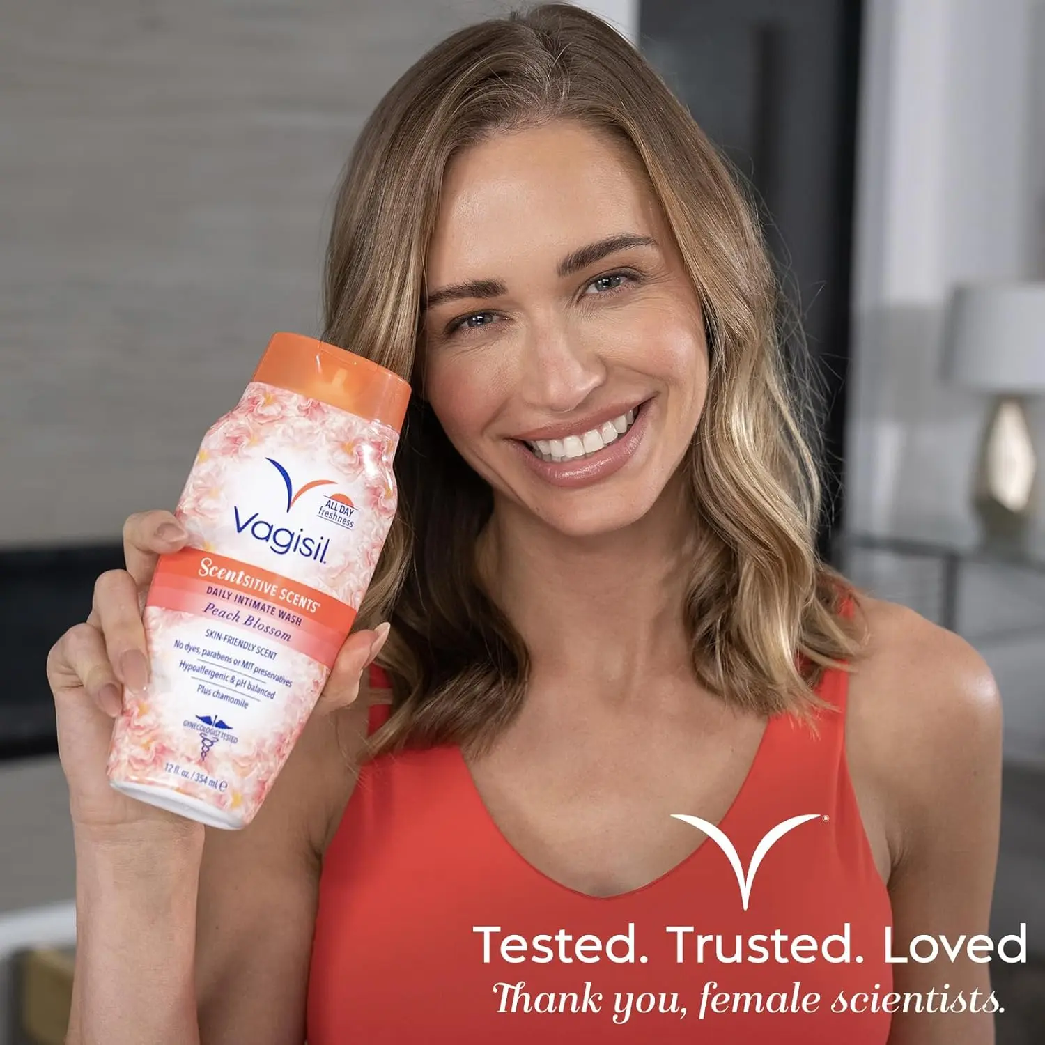 Three bottles of Vagisil Peach Blossom Scentsitive Scents feminine wash provide gentle and hypoallergenic cleansing for intimate area hygiene, formulated with Vitamin E for soothing freshness and a light, fruity fragrance.
