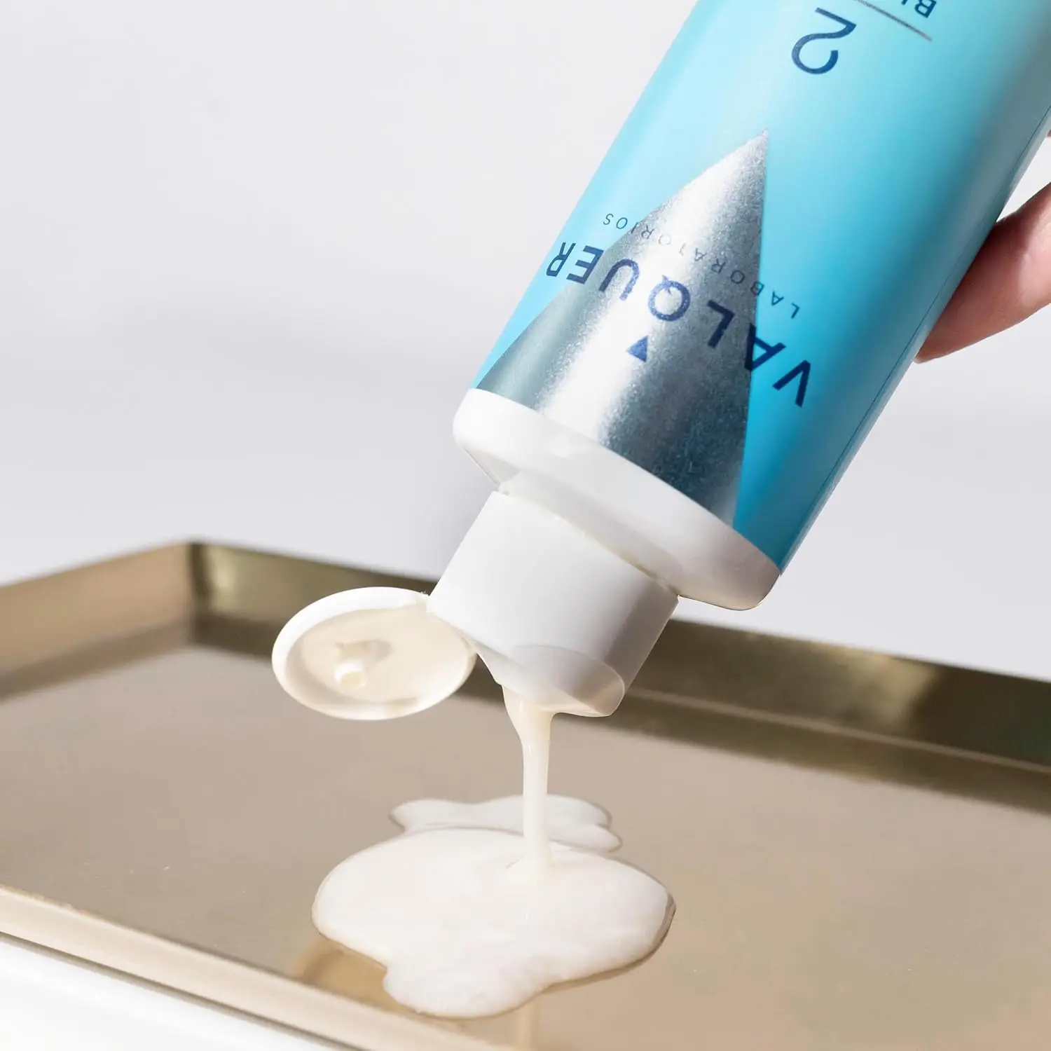 Valquer Bioplex No. 1 and No. 2 are shown, a vegan hair treatment pack designed to reconstruct, repair, and protect damaged hair, providing strength and shine.