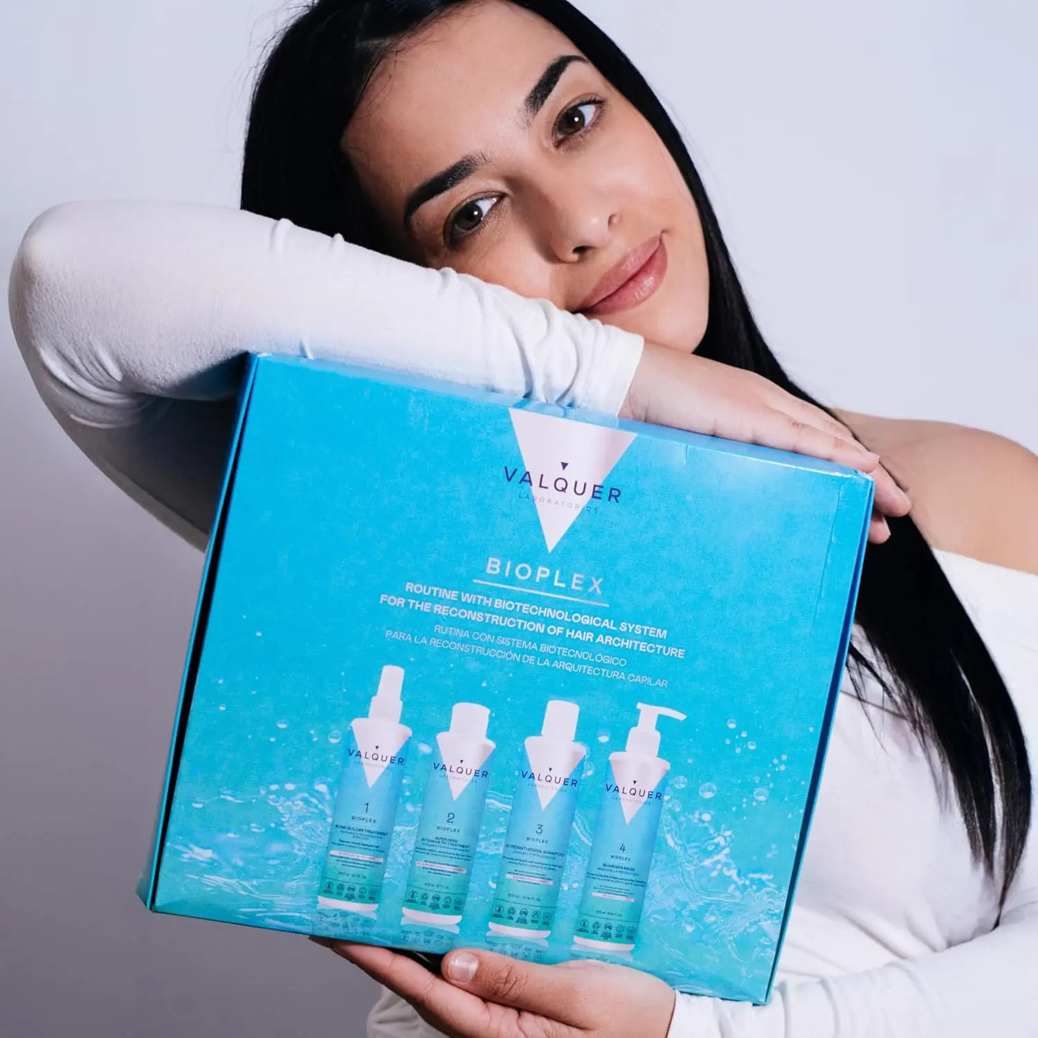 Valquer Bioplex No. 1 and No. 2 are shown, a vegan hair treatment pack designed to reconstruct, repair, and protect damaged hair, providing strength and shine.