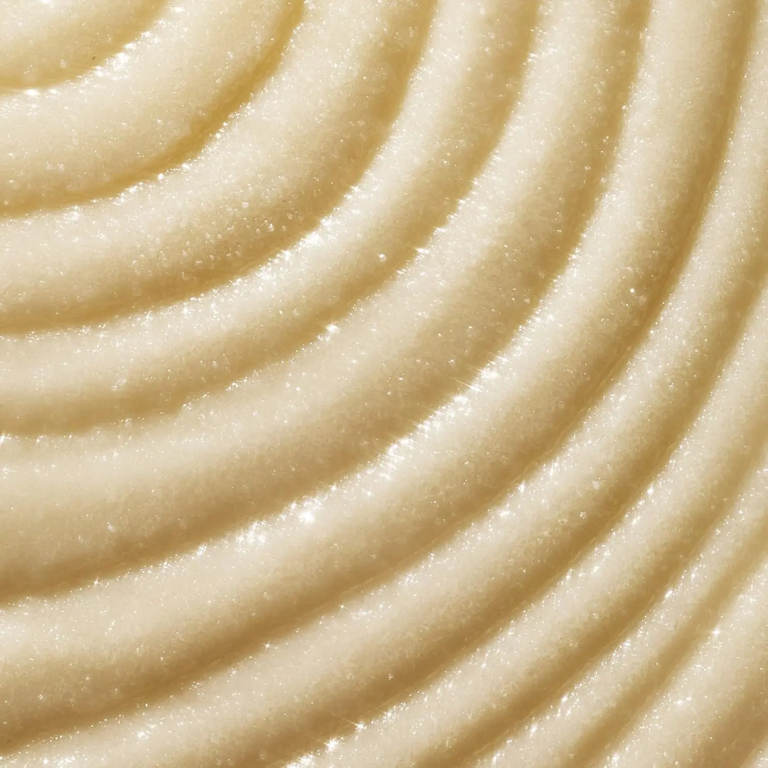 An 18 oz jar of Tree Hut Vanilla Shea Sugar Scrub exfoliates and hydrates skin, leaving it glowing, soft, and smooth with a warm vanilla scent.