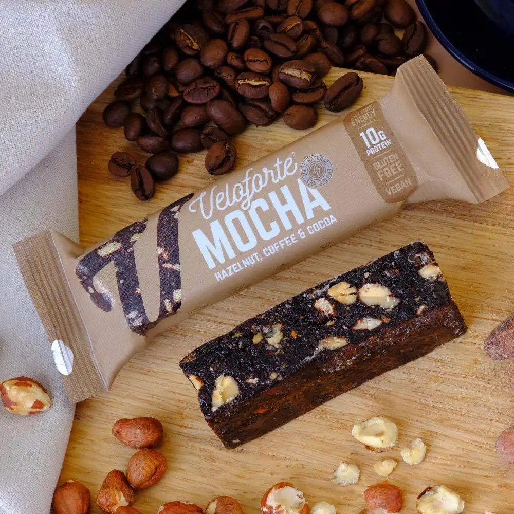 Veloforte Mocha protein bar with hazelnut, coffee and cocoa provides 10g of plant protein and 37g of carbs for optimal workout refuelling, is 100% natural, vegan and gluten free.