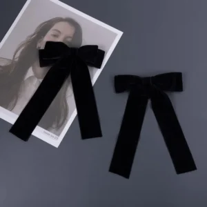 This image showcases two handmade velvet bow hair clips, ideal hair accessories for women and girls to add elegance to any hairstyle.