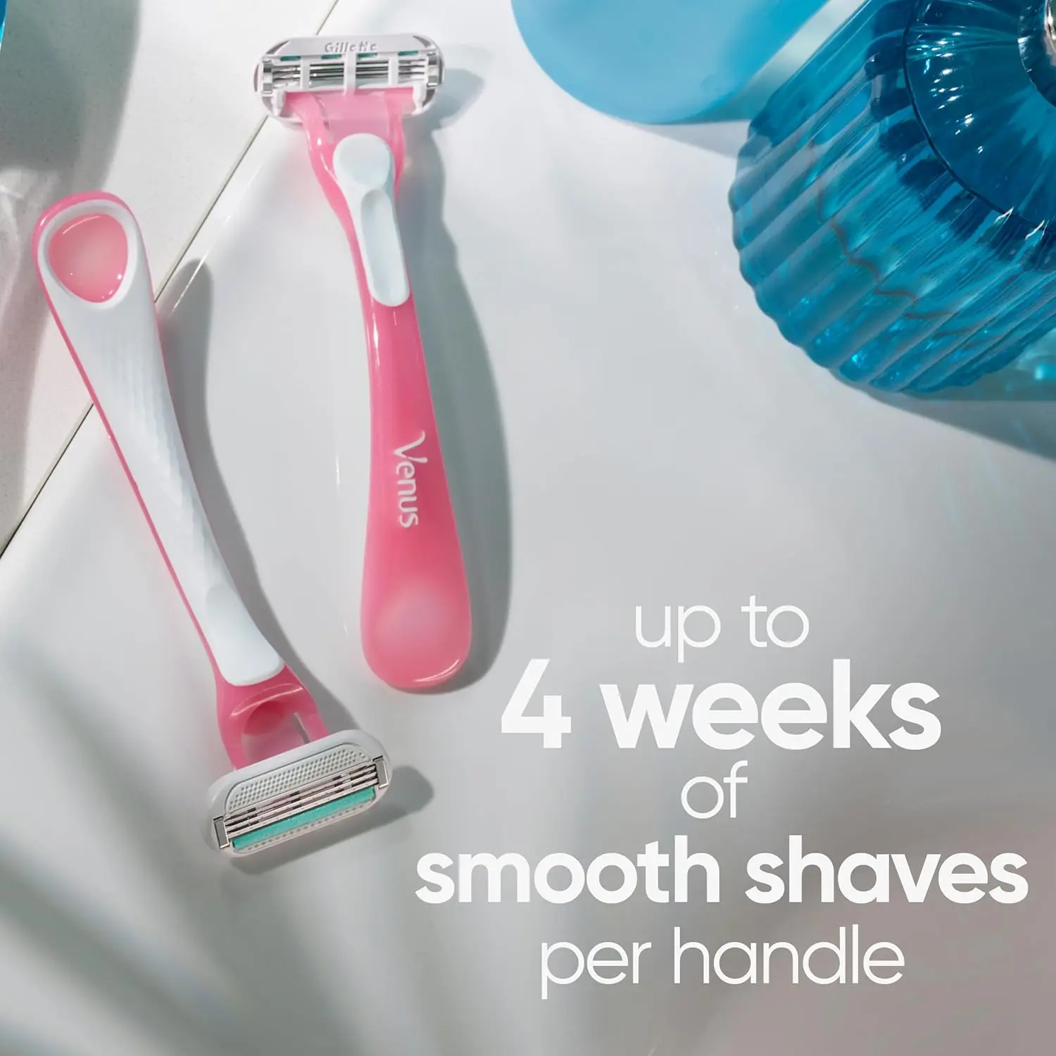 Close-up of Venus SkinElixir sensitive disposable razors featuring 3 blades and a SkinElixir lubrastrip for a smooth, irritation-free shave.