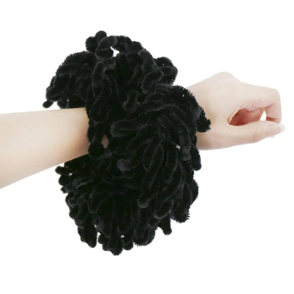 Black volumizing hijab scrunchie, 9 inches in diameter, designed to add volume and shape to the hair under a hijab scarf.
