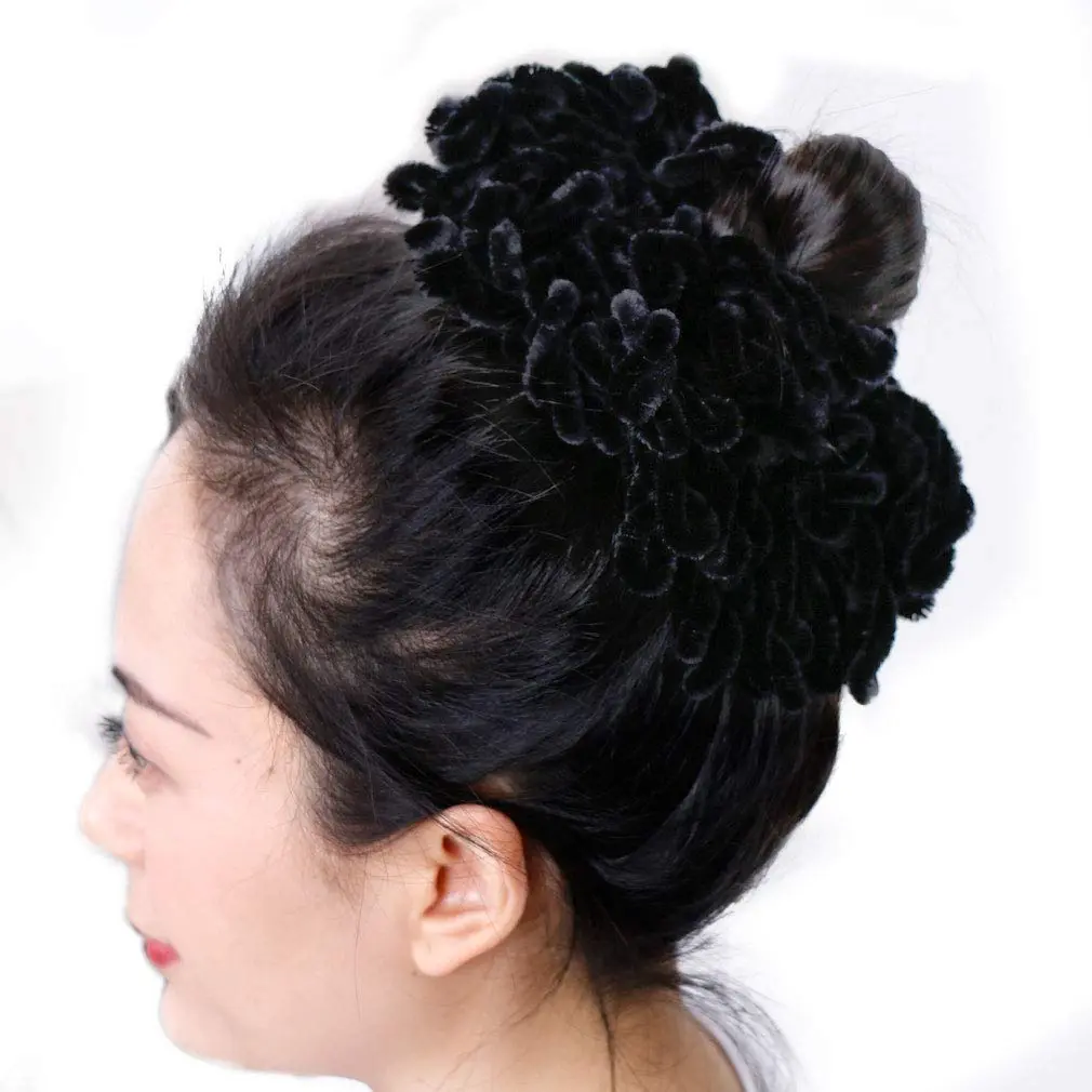 Black volumizing hijab scrunchie, 9 inches in diameter, designed to add volume and shape to the hair under a hijab scarf.