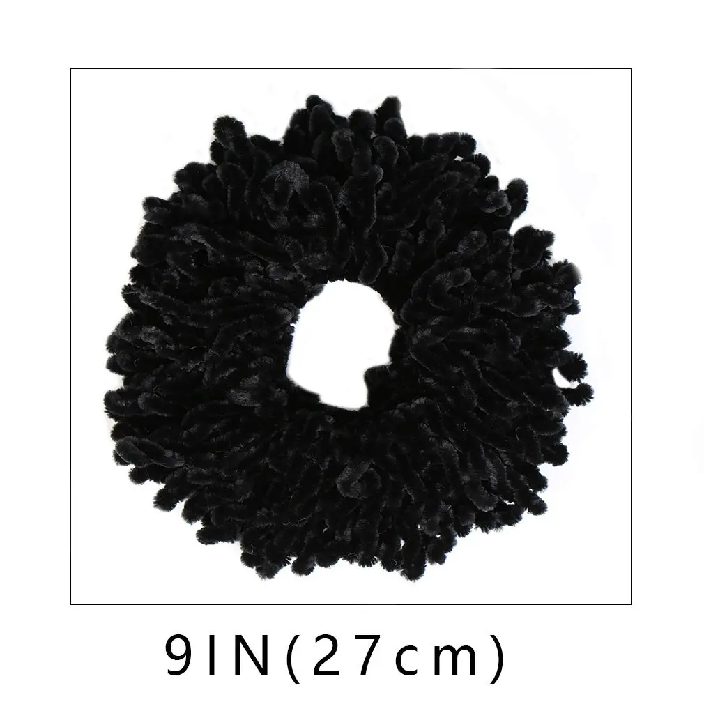 Black volumizing hijab scrunchie, 9 inches in diameter, designed to add volume and shape to the hair under a hijab scarf.