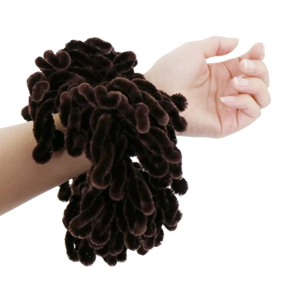 Black volumizing hijab scrunchie, 9 inches in diameter, designed to add volume and shape to the hair under a hijab scarf.