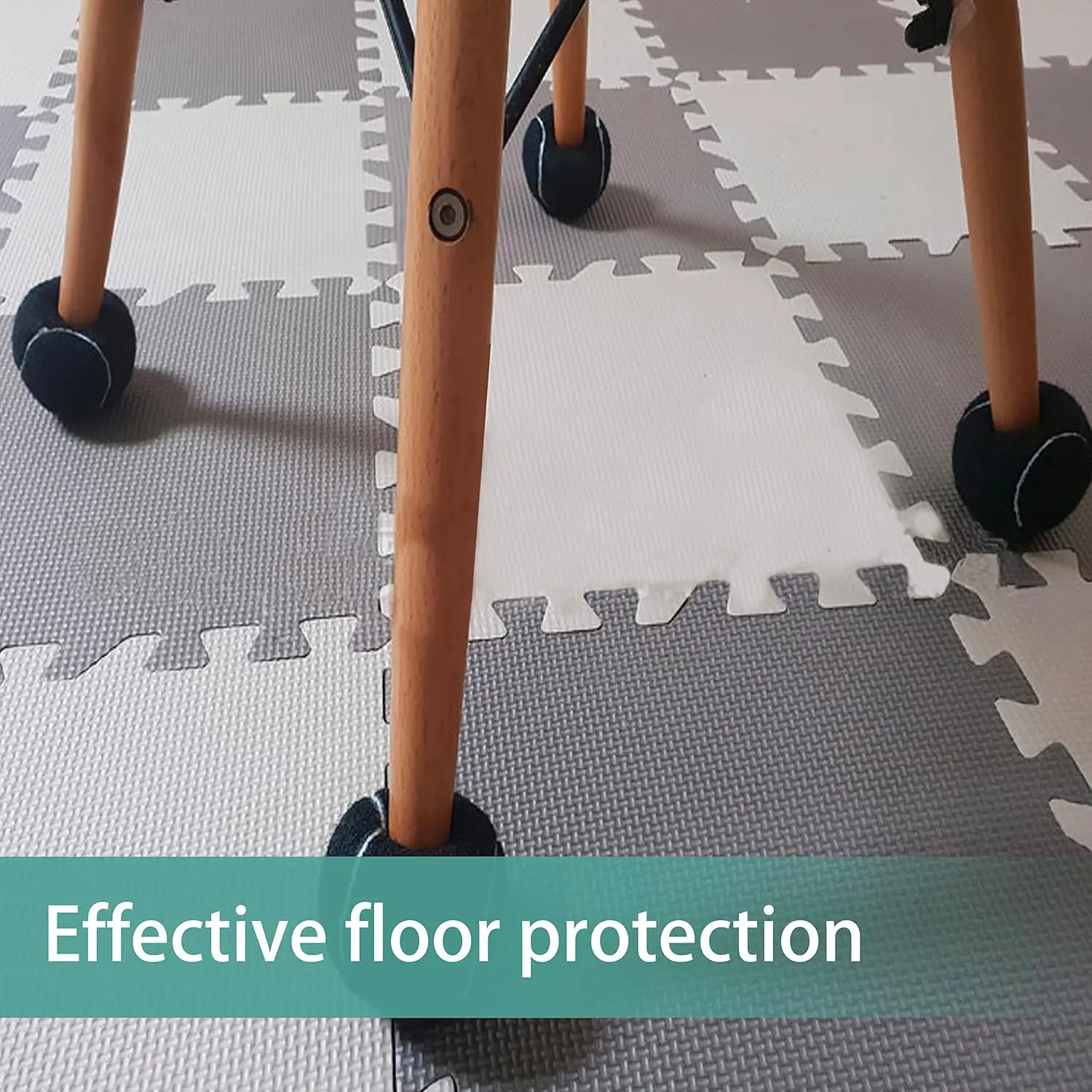 Two precut black tennis balls designed to protect hardwood floors and furniture legs like chairs, desks, tables, and walkers from scratches.