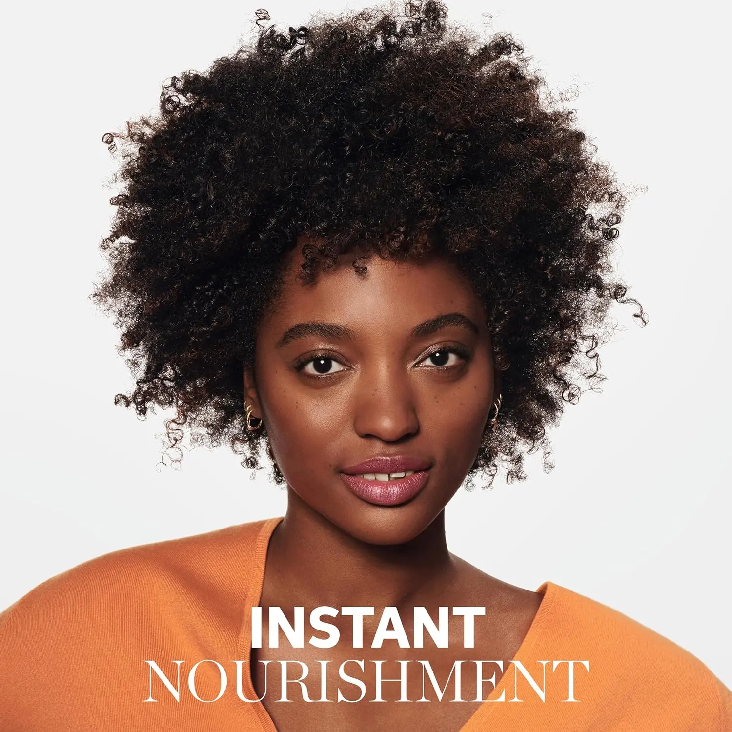 A jar of Wella Nutri-Enrich Mask designed to deeply nourish, moisturize, and revitalize dry and distressed hair with its unique blend of vitamins.