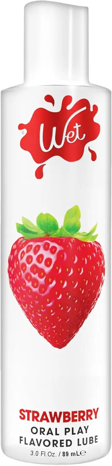 A bottle of Wet strawberry flavored lube that is paraben-free, gluten-free, and sugar-free for enjoyable oral play.